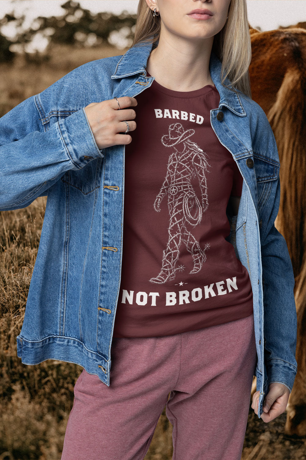red-rock-chaos-barbed-not-broken-cowgirl-shirt-Model-Maroon
