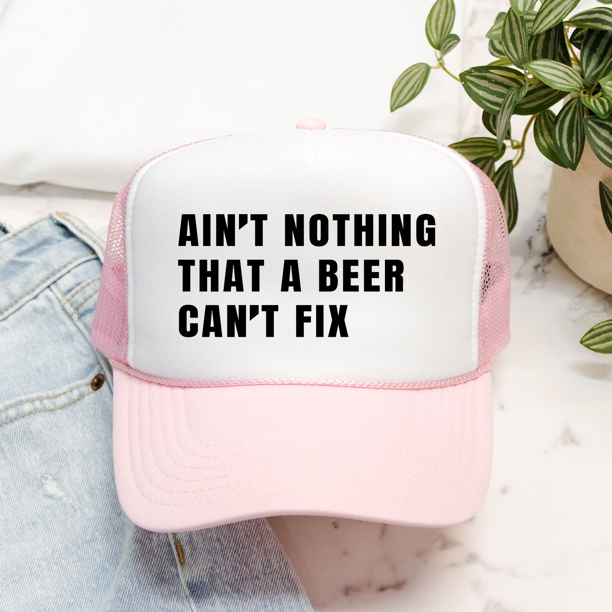 Ain’t Nothing That a Beer Can’t Fix Foam Embroidered Trucker Hat in Black Text