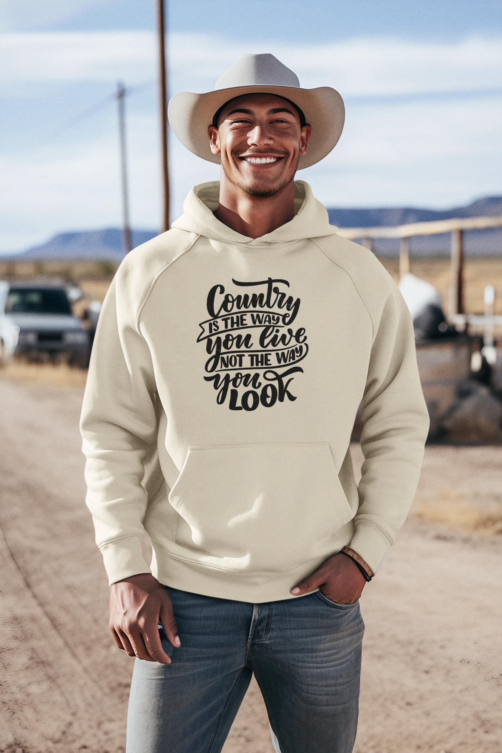 Model-wearing-red-rock-chaos-country-is-the-way-you-live-sweatshirt-black-text-gildan-crewneck-sand