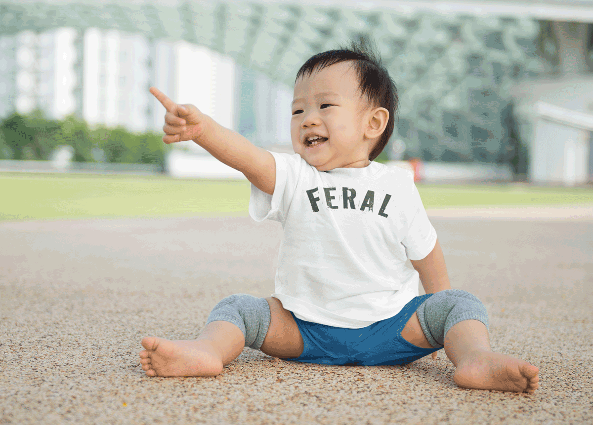 Red-Rock-Chaos-Feral-baby-boy-pointing-away-White
