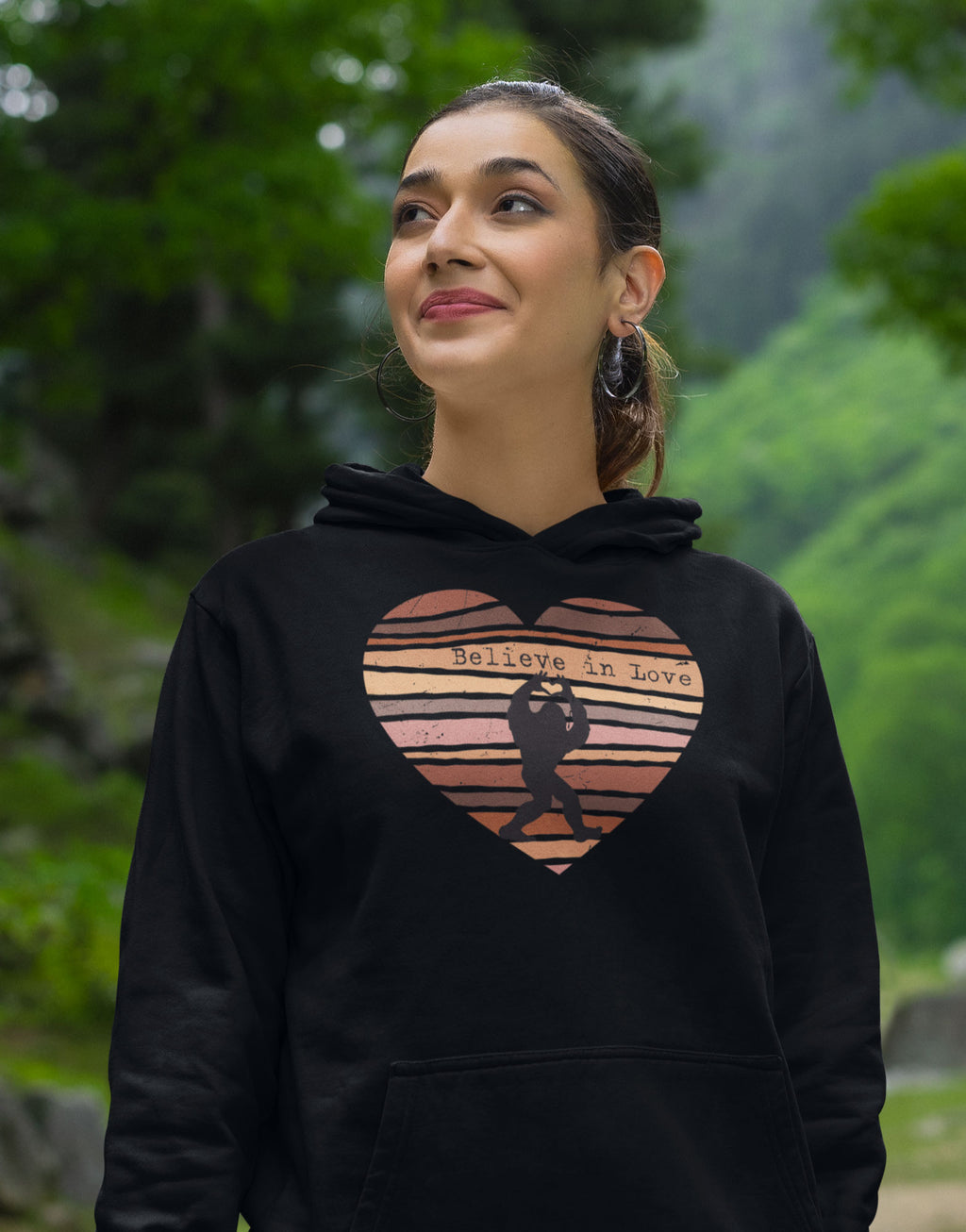 Red_Rock_Chaos_gildan-pullover-hoodie-believe-in-love-bigfoot-retro-distressed-heart-cryptid-design