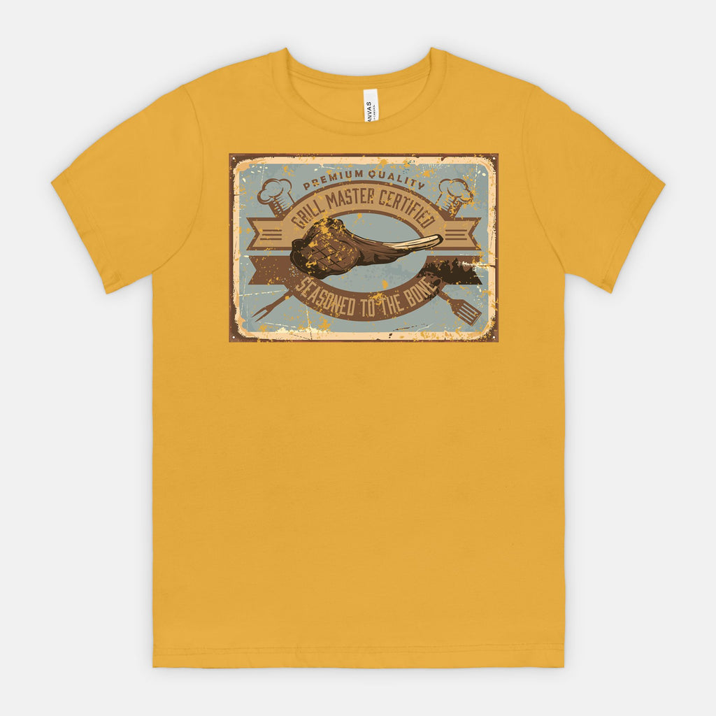 Mustard t-shirt with a graphic Grill Master Certified - Seasoned to the Bone on a white background