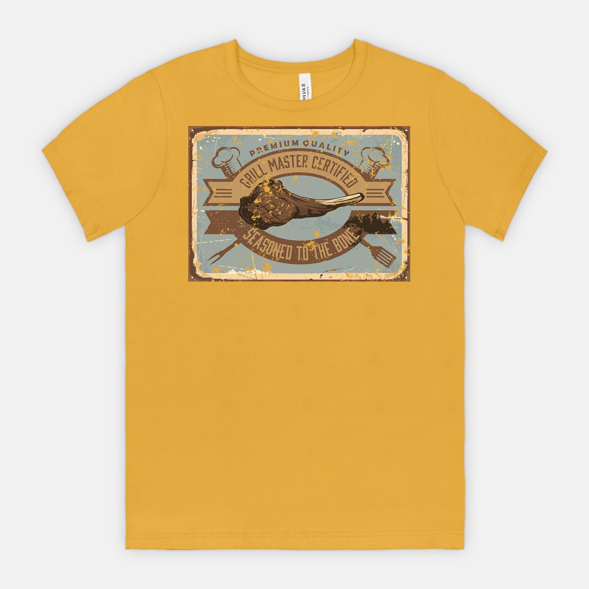 Mustard t-shirt with a graphic Grill Master Certified - Seasoned to the Bone on a white background
