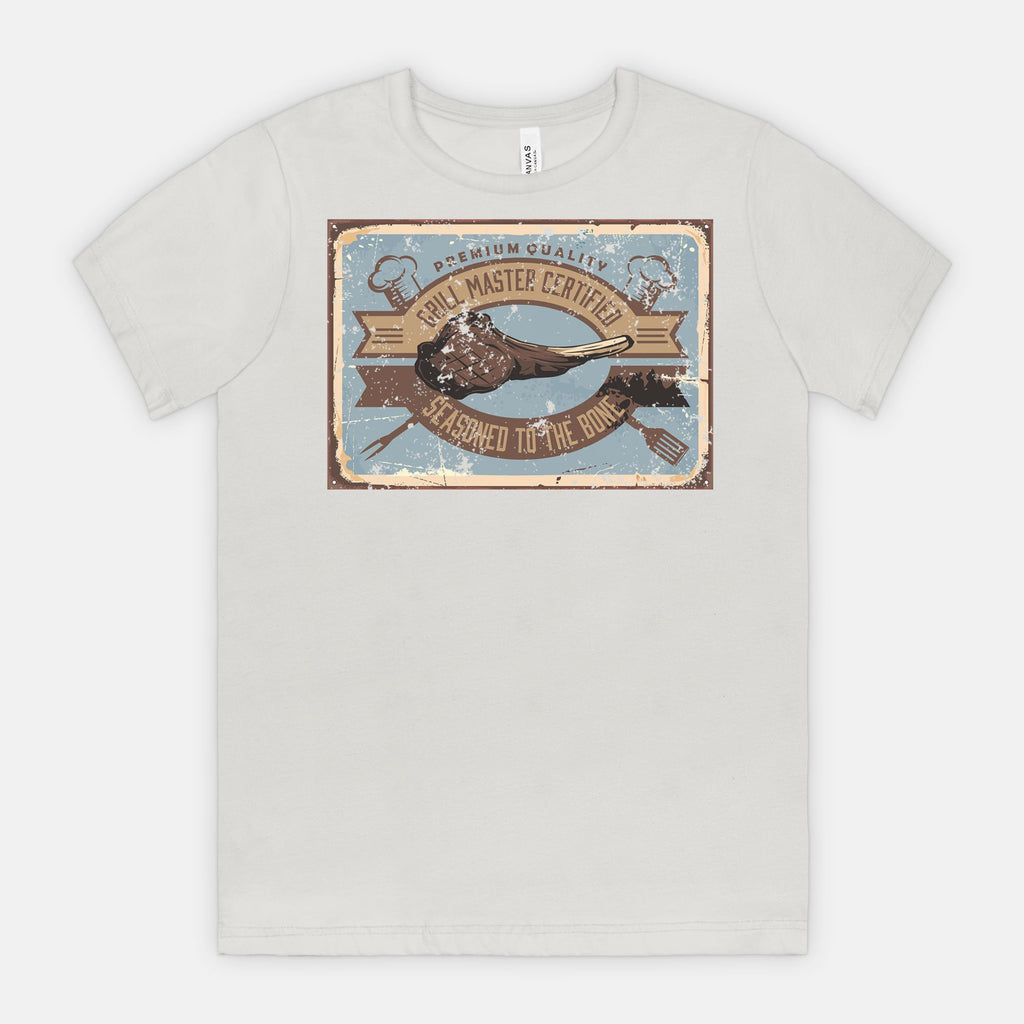 Silver t-shirt with a graphic Grill Master Certified - Seasoned to the Bone on a white background