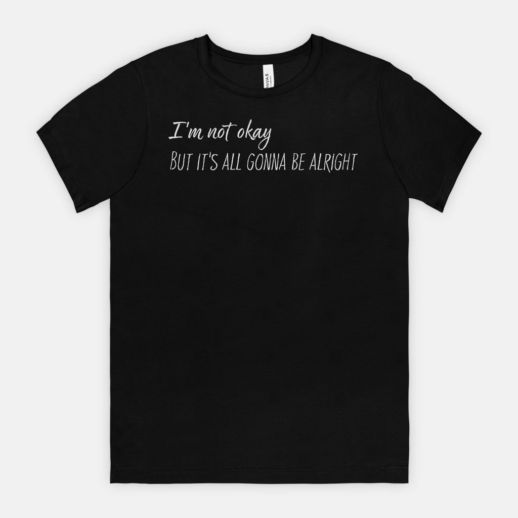 Black t-shirt with white text "I'm not okay but it's all gonna be alright"
on a white background