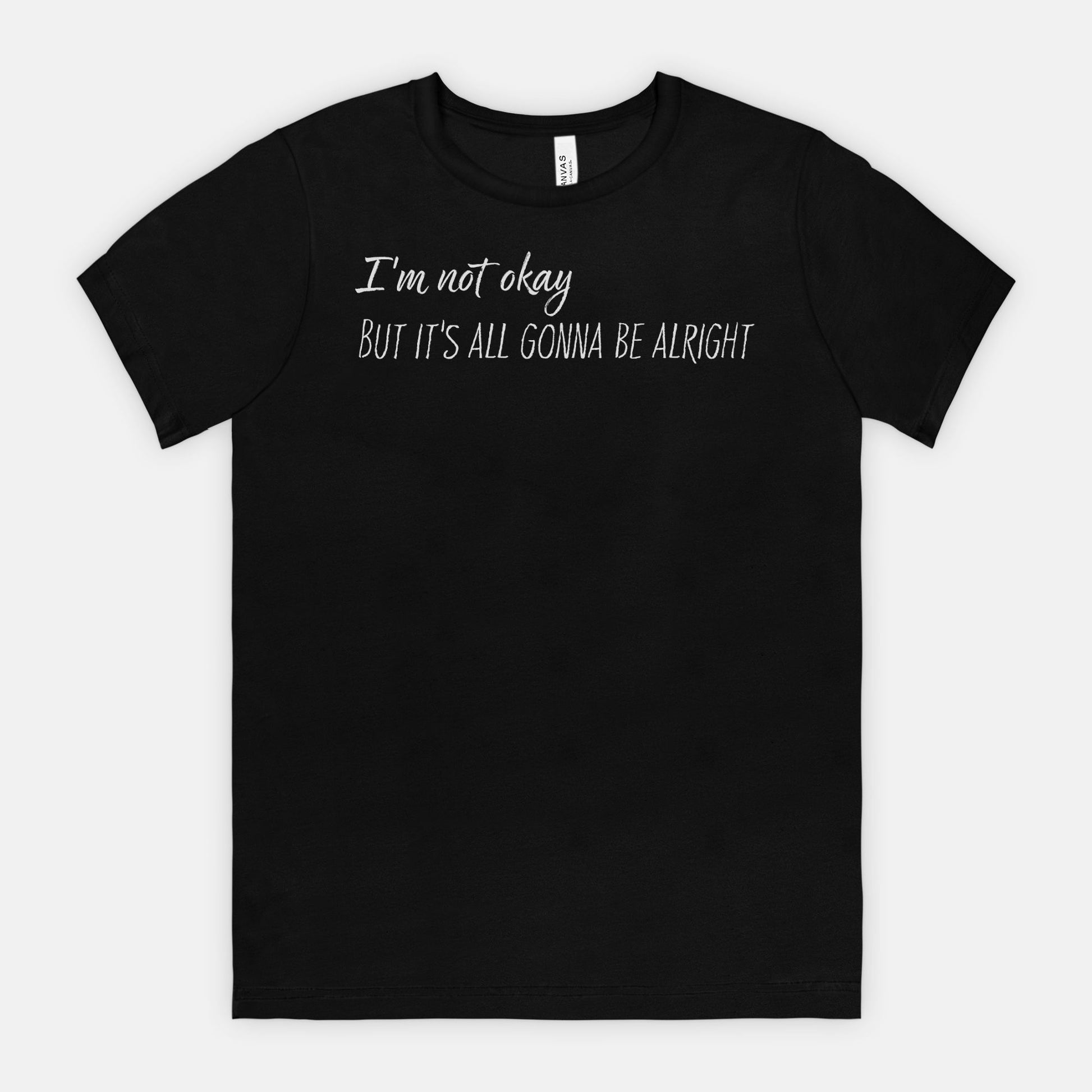 Black t-shirt with white text "I'm not okay but it's all gonna be alright"
on a white background