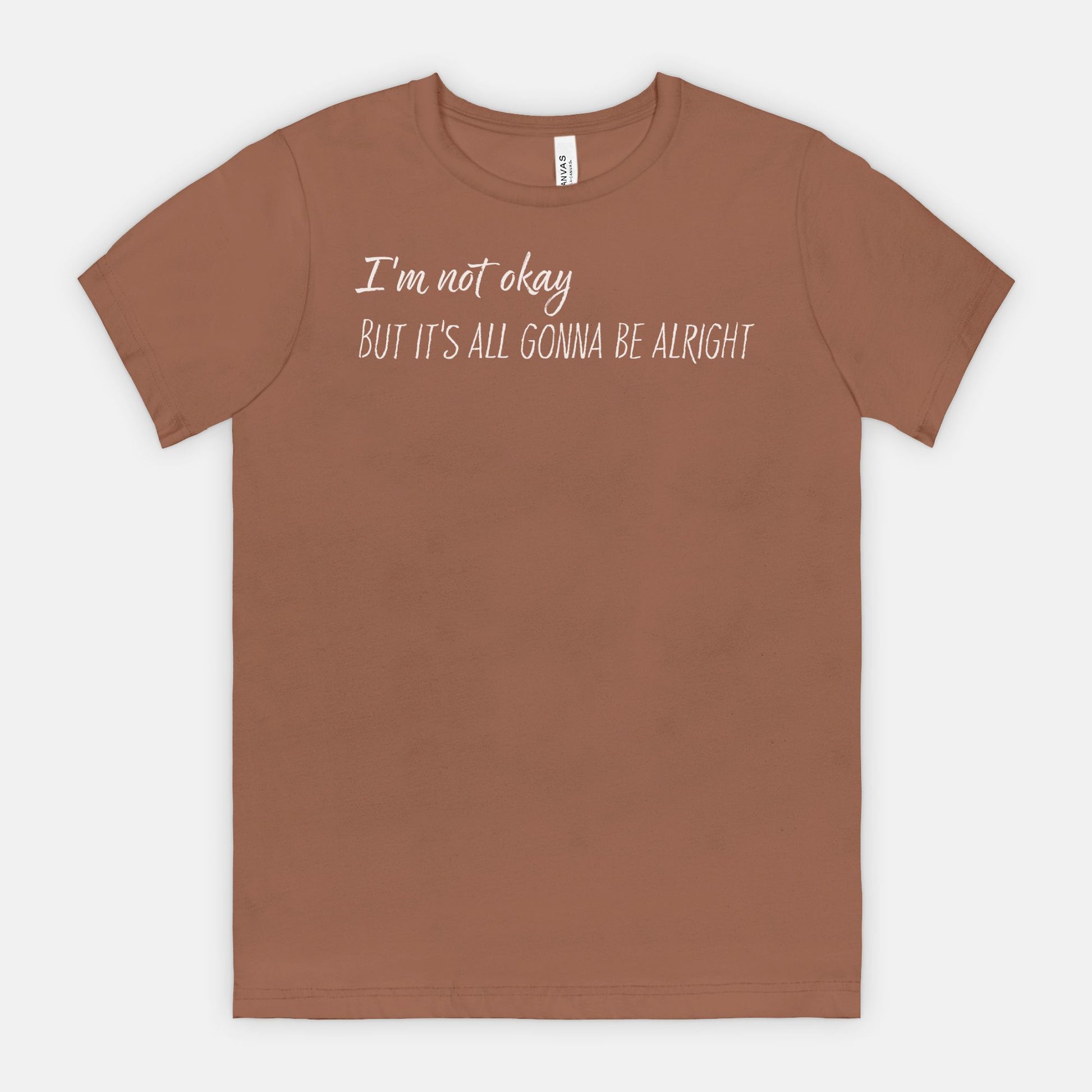 Chestnut t-shirt with white text "I'm not okay but it's all gonna be alright"
 on a white background