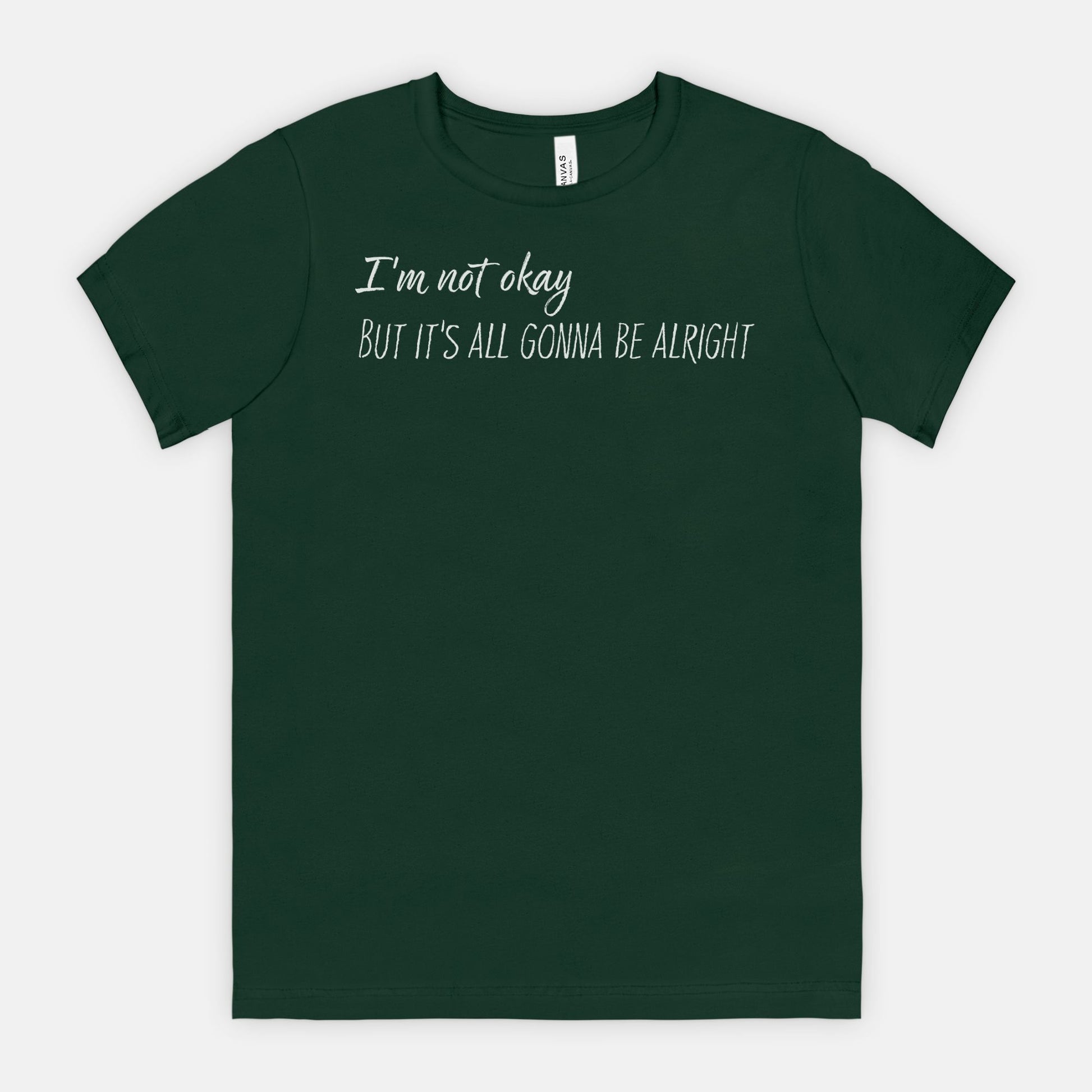 Forest Green t-shirt with white text "I'm not okay but it's all gonna be alright"
 on a white background