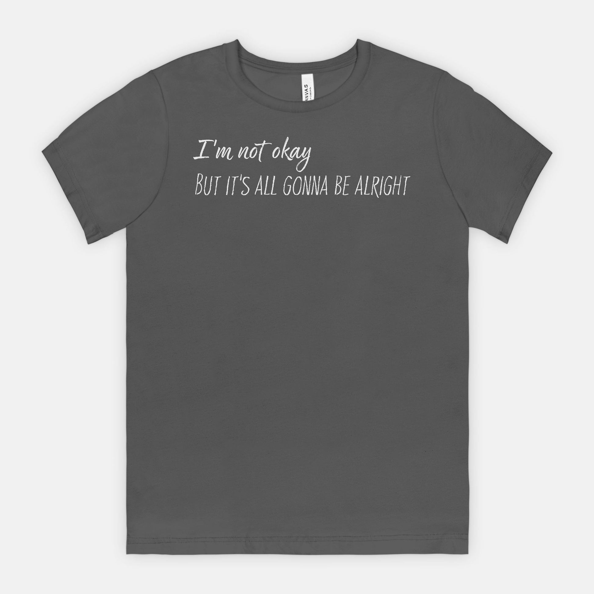 Gray t-shirt with white text "I'm not okay but it's all gonna be alright" on a white background