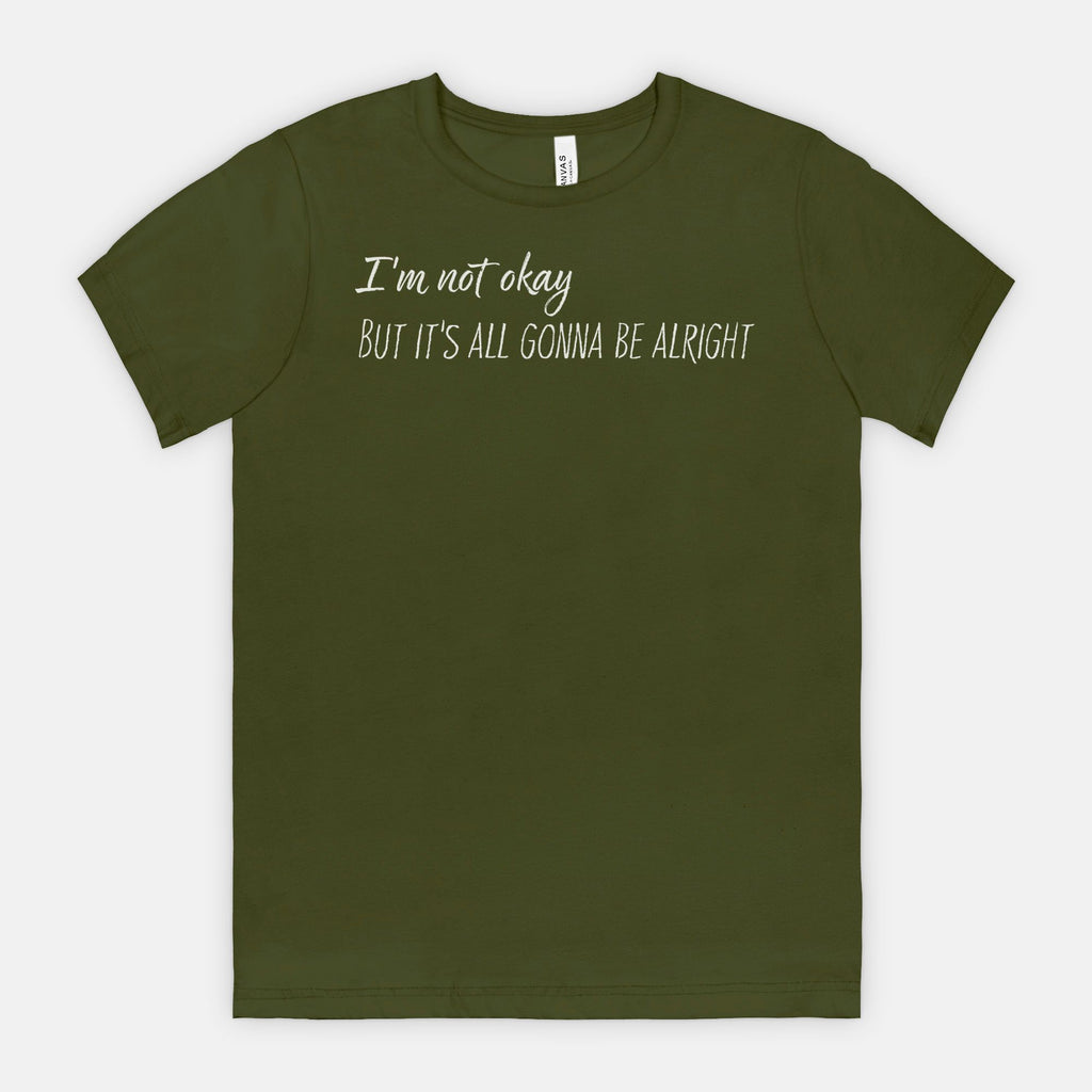 Olive Green t-shirt with white text "I'm not okay but it's all gonna be alright"on a white background