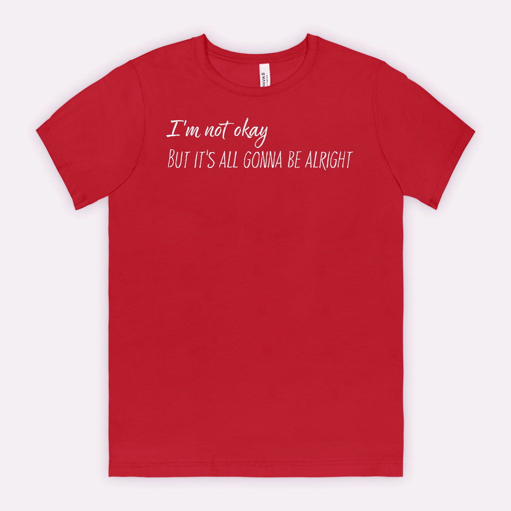 Red t-shirt with white text "I'm not okay but it's all gonna be alright"
on a white background