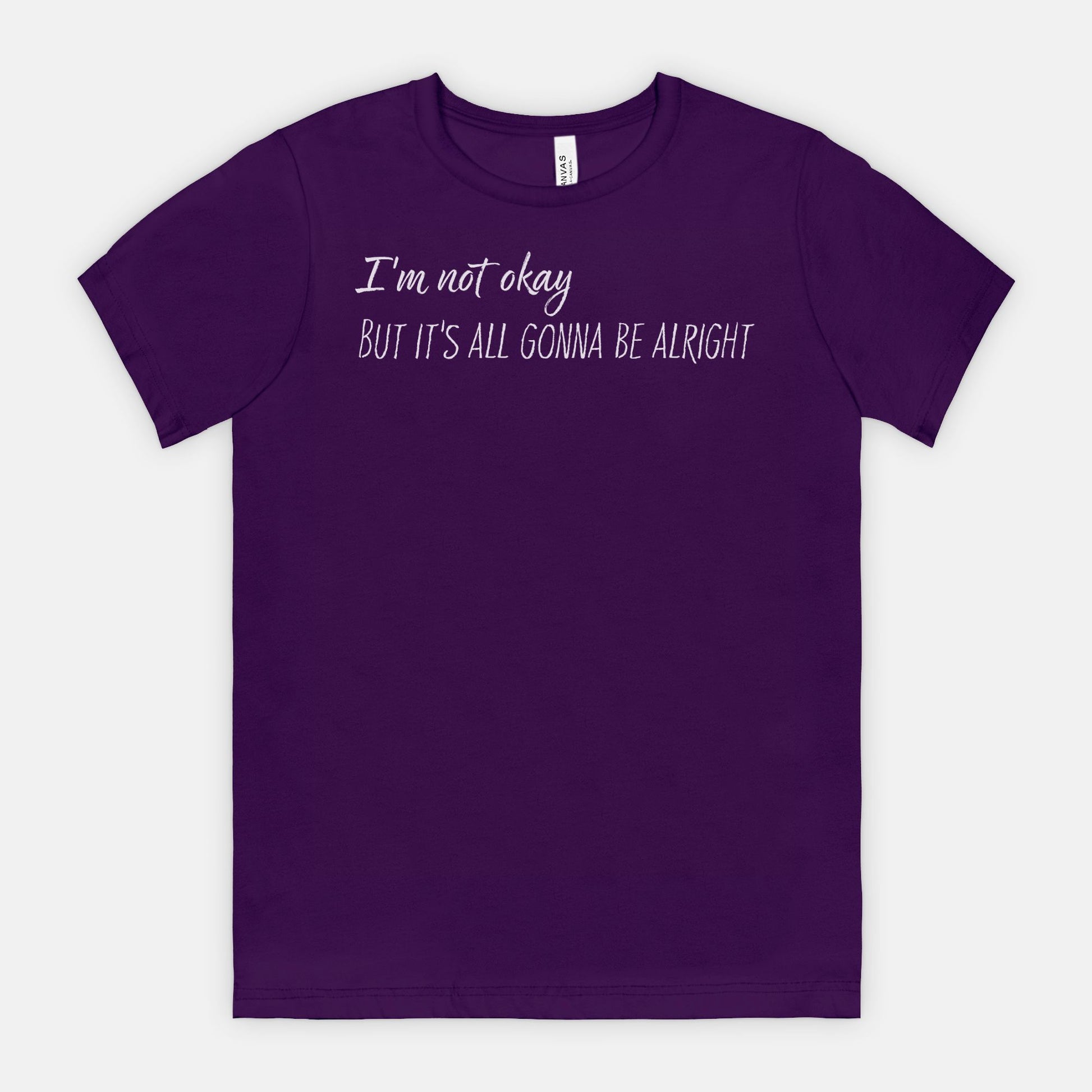 Team Purple t-shirt with white text "I'm not okay but it's all gonna be alright" on a white background