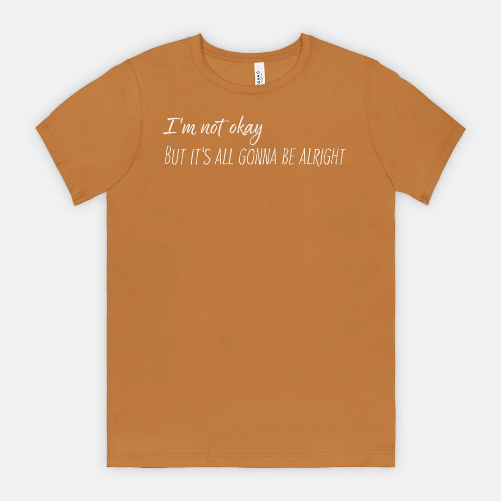 Toast t-shirt with white text "I'm not okay but it's all gonna be alright" on a white background