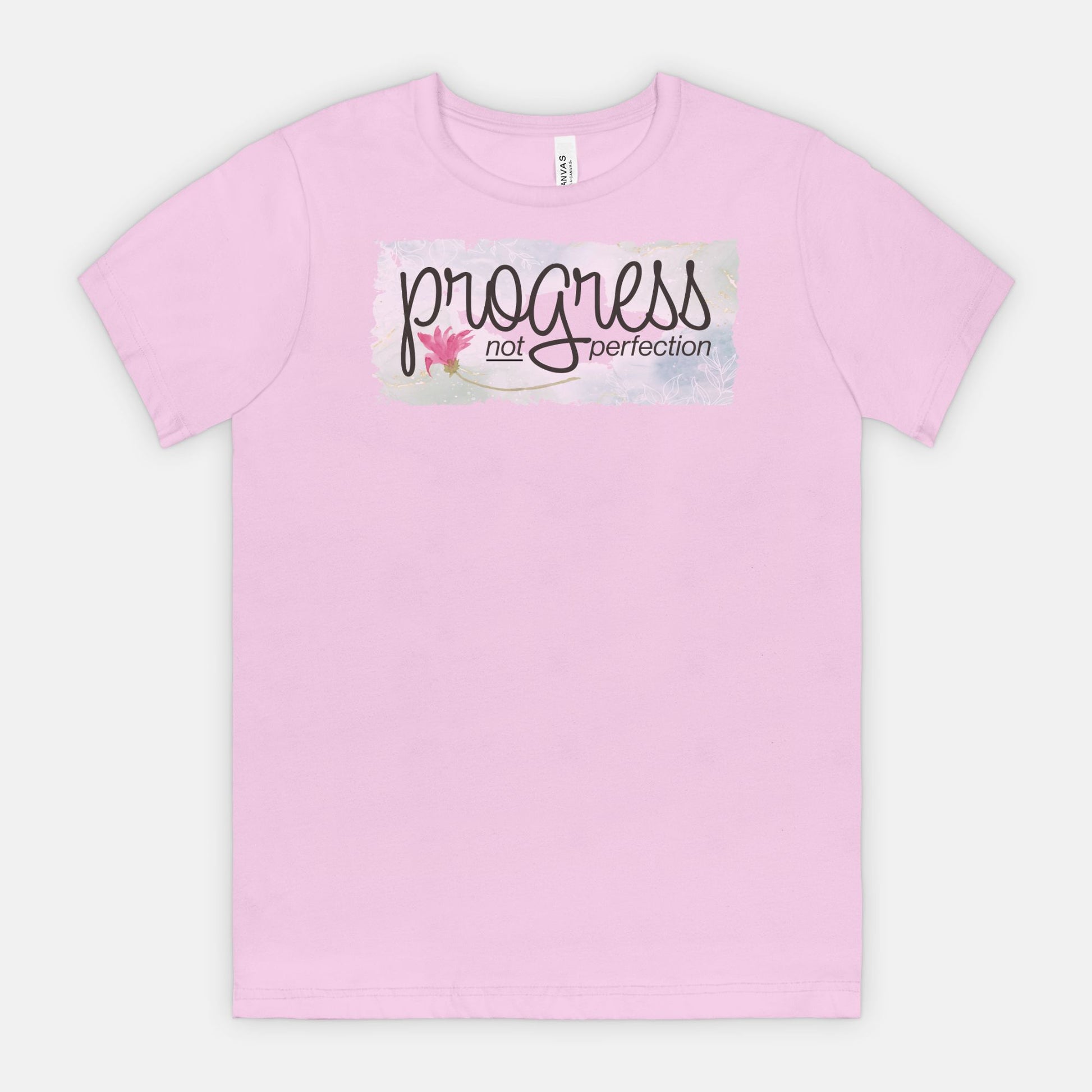 Lilac t-shirt with 'progress not perfection' text on a white background