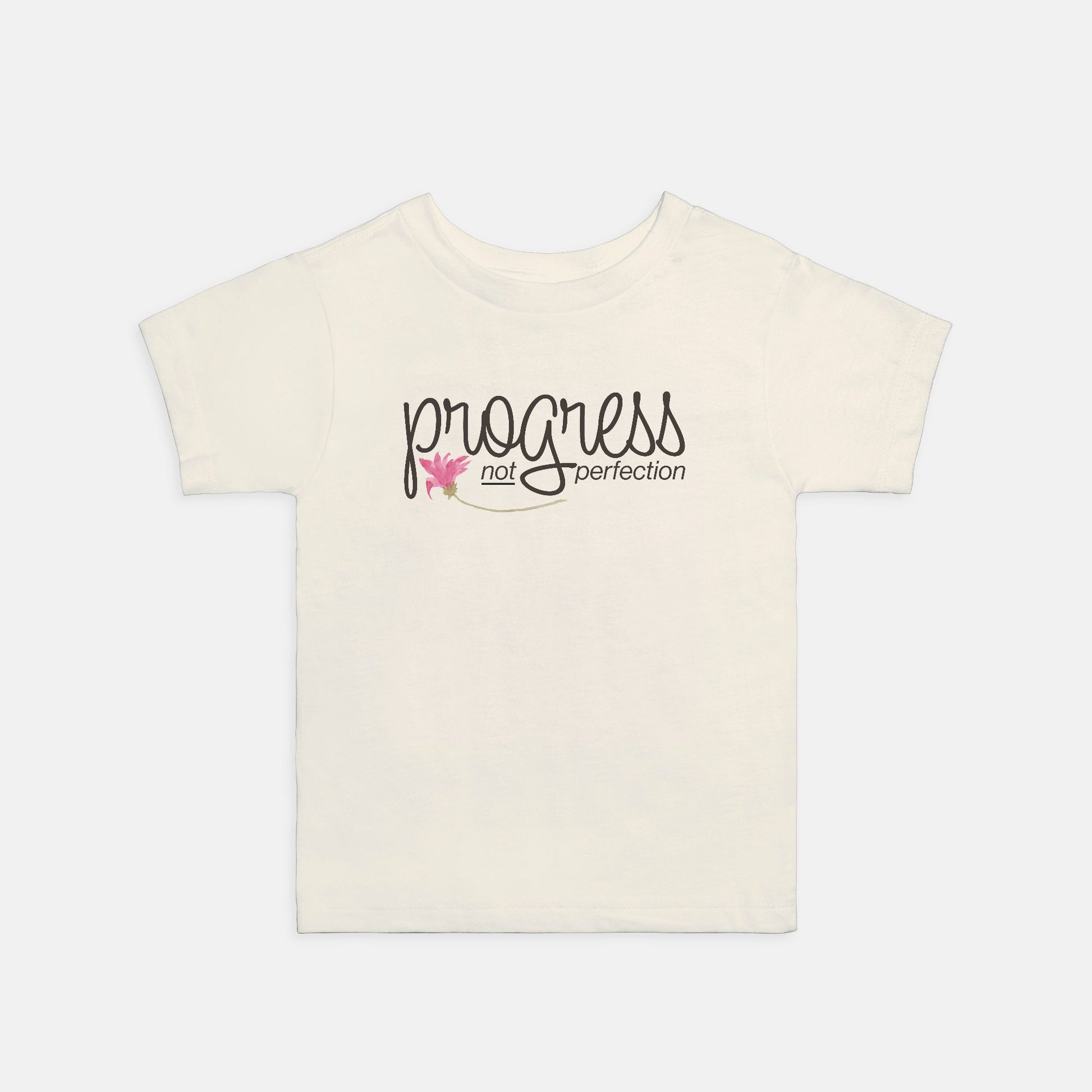 Natural t-shirt with 'progress not perfection' text on a white background