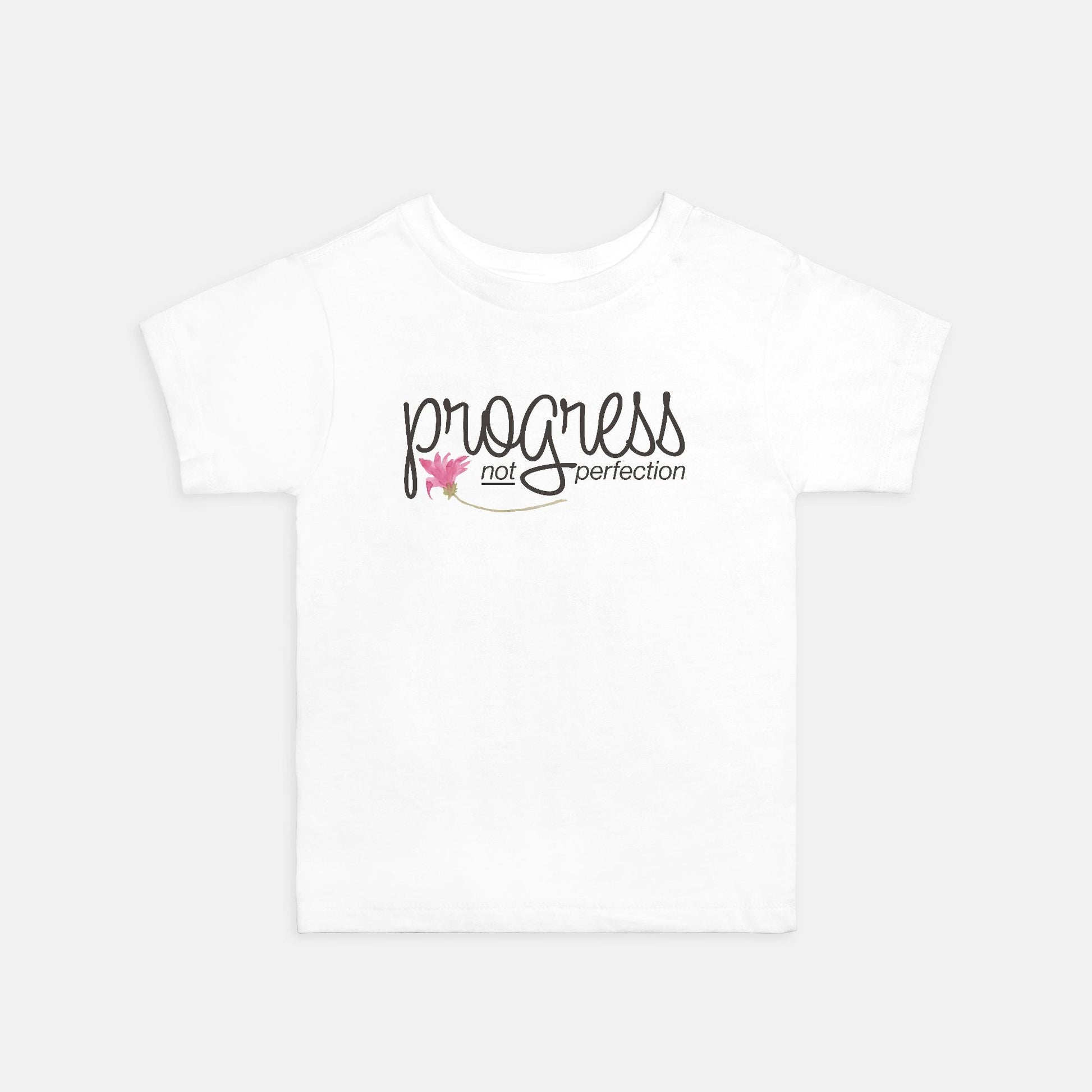White t-shirt with 'progress not perfection' text and a pink butterfly on a white background