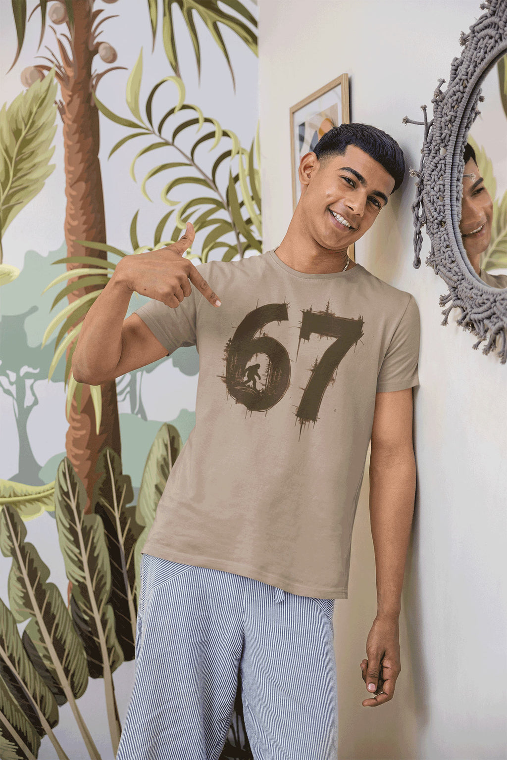 red-rock-chaos-67-bigfoot-model-wearing-graphic-tee-bella-canvas-3001-Tan