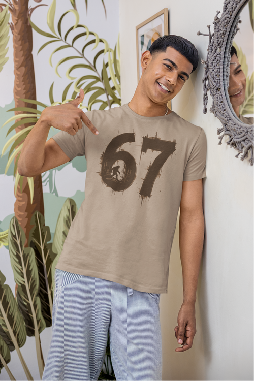 red-rock-chaos-67-bigfoot-model-wearing-graphic-tee-bella-canvas-3001-Tan