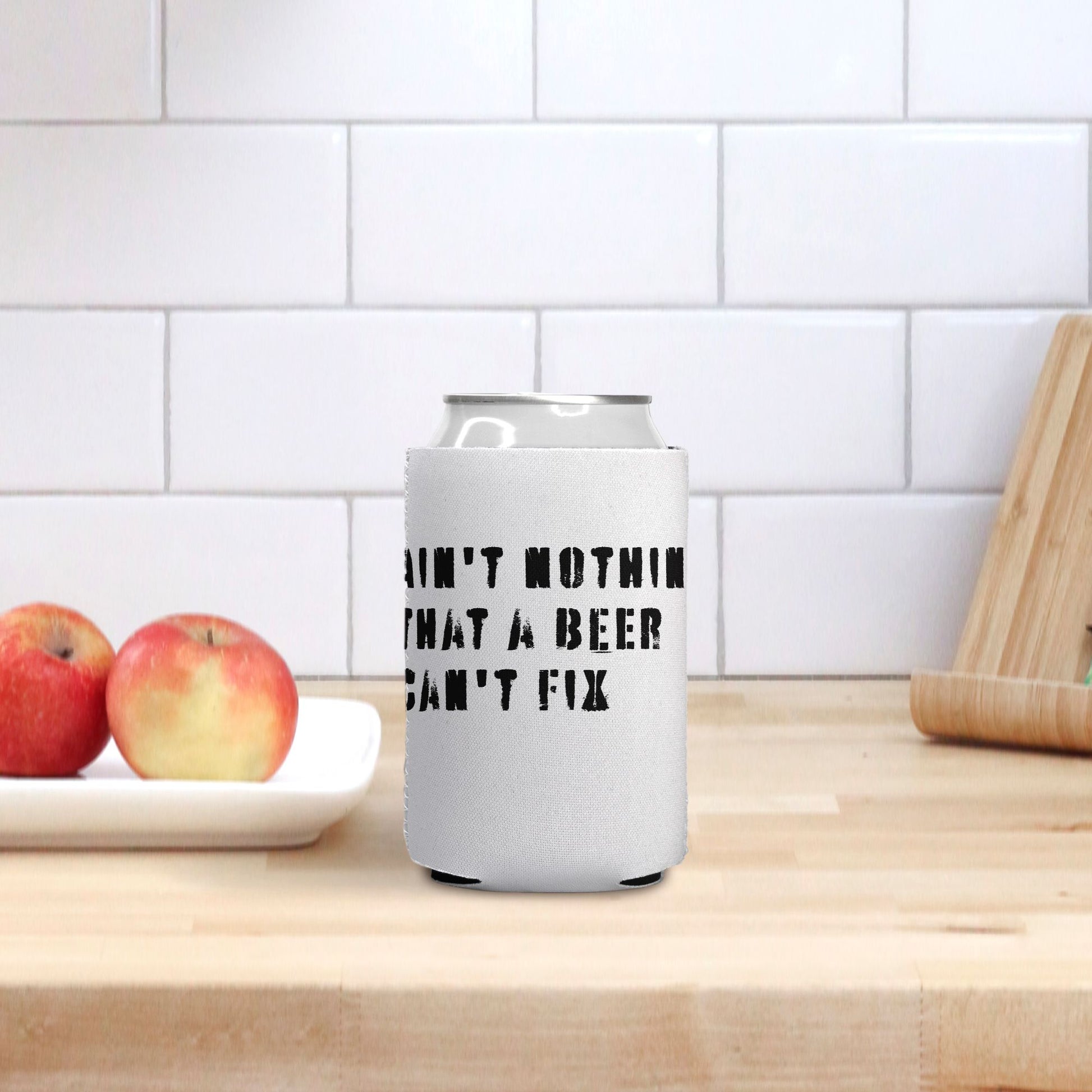 red-rock-chaos-aint-nothing-that-a-beer-cant-fix-can-koozie-black-text-white