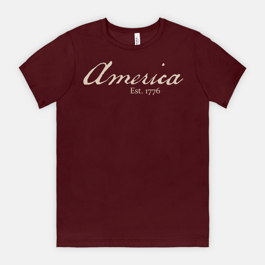 Vintage America Est. 1776 heritage script patriotic design on Bella Canvas 3001 Maroon T-shirt by Red Rock Chaos