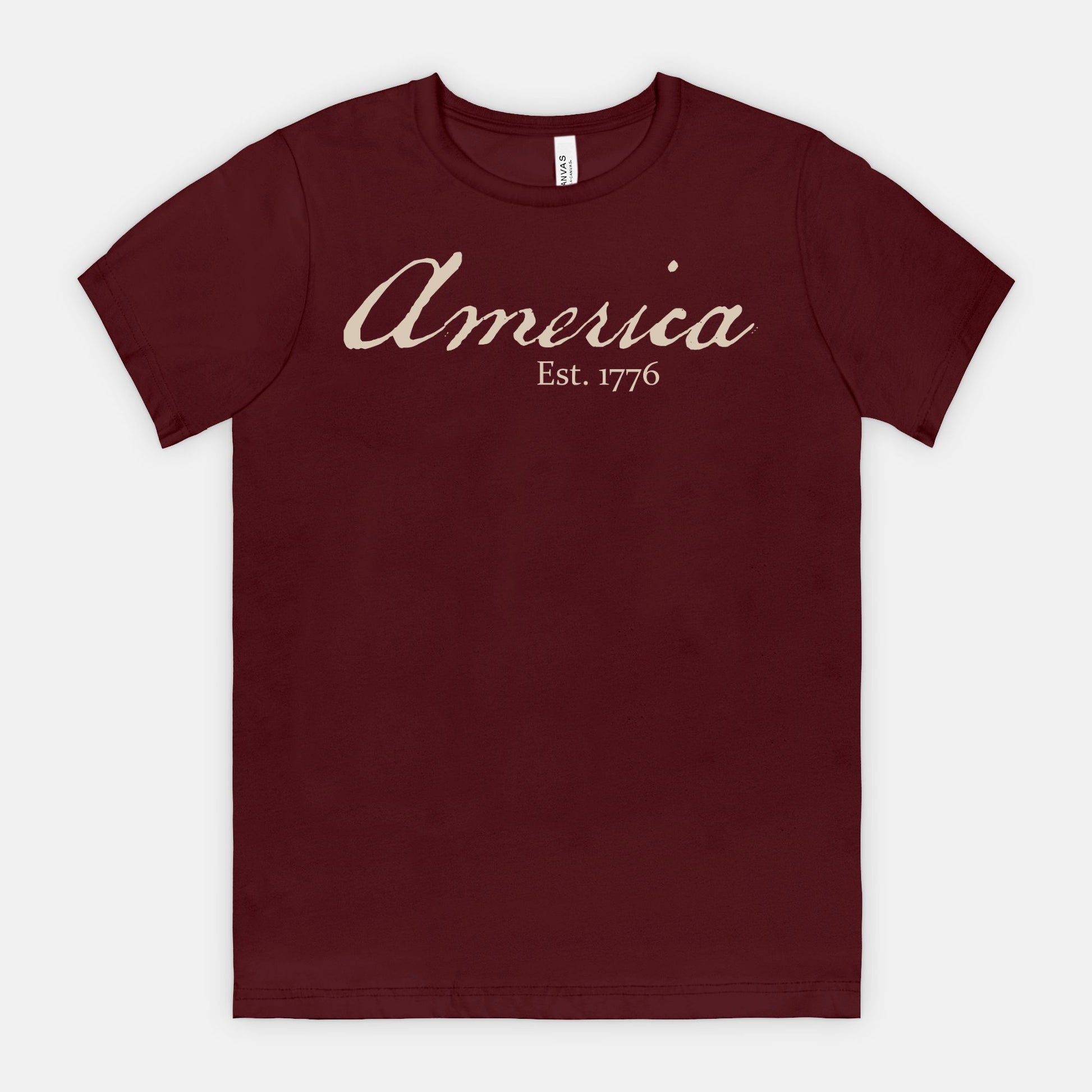 Vintage America Est. 1776 heritage script patriotic design on Bella Canvas 3001 Maroon T-shirt by Red Rock Chaos