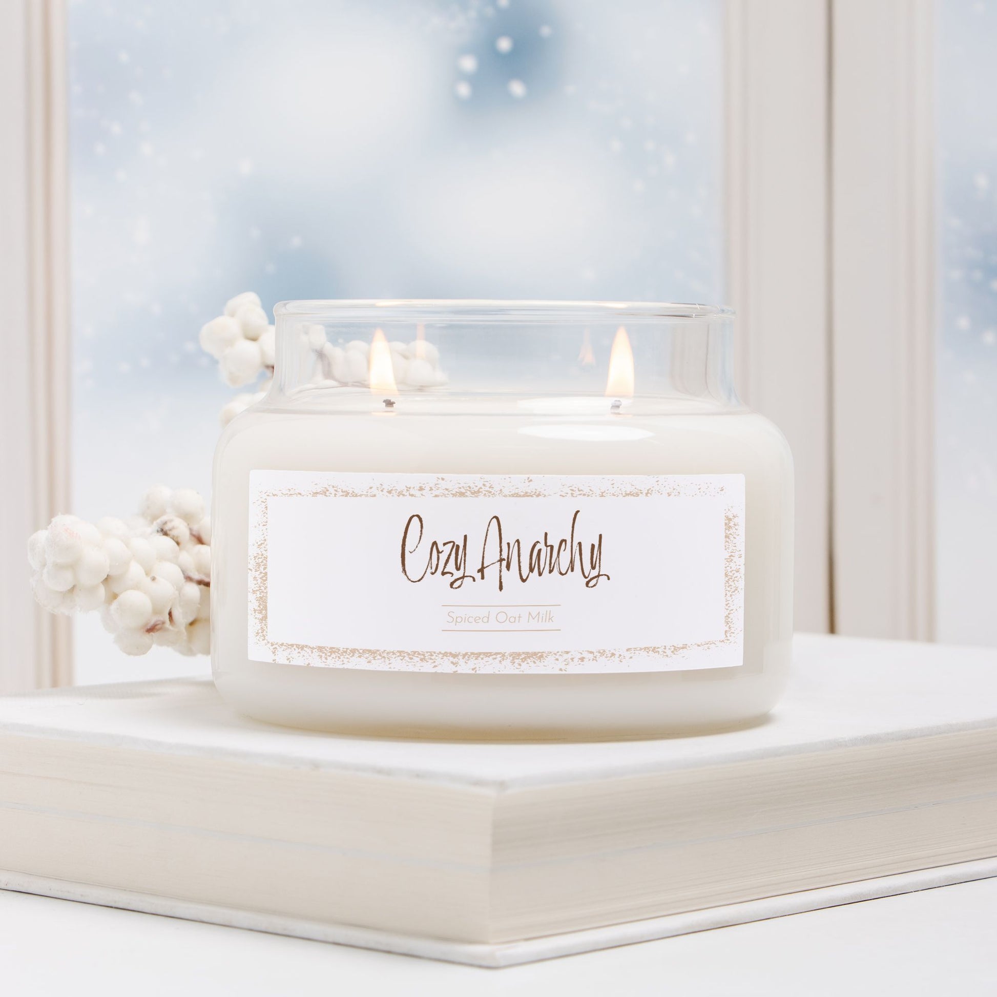 Cozy Anarchy – Spiced Oat Milk soy candle, 50-hour burn. Hand-poured USA chaos candle in glass jar with gold lid, designed by Red Rock Chaos.