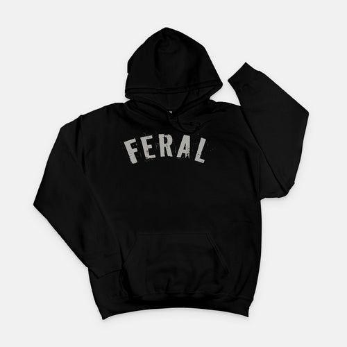 Gildan 18500 Black hoodie featuring the word “FERAL” in bold distressed brown lettering, designed by Red Rock Chaos for a minimalist wild-at-heart style.