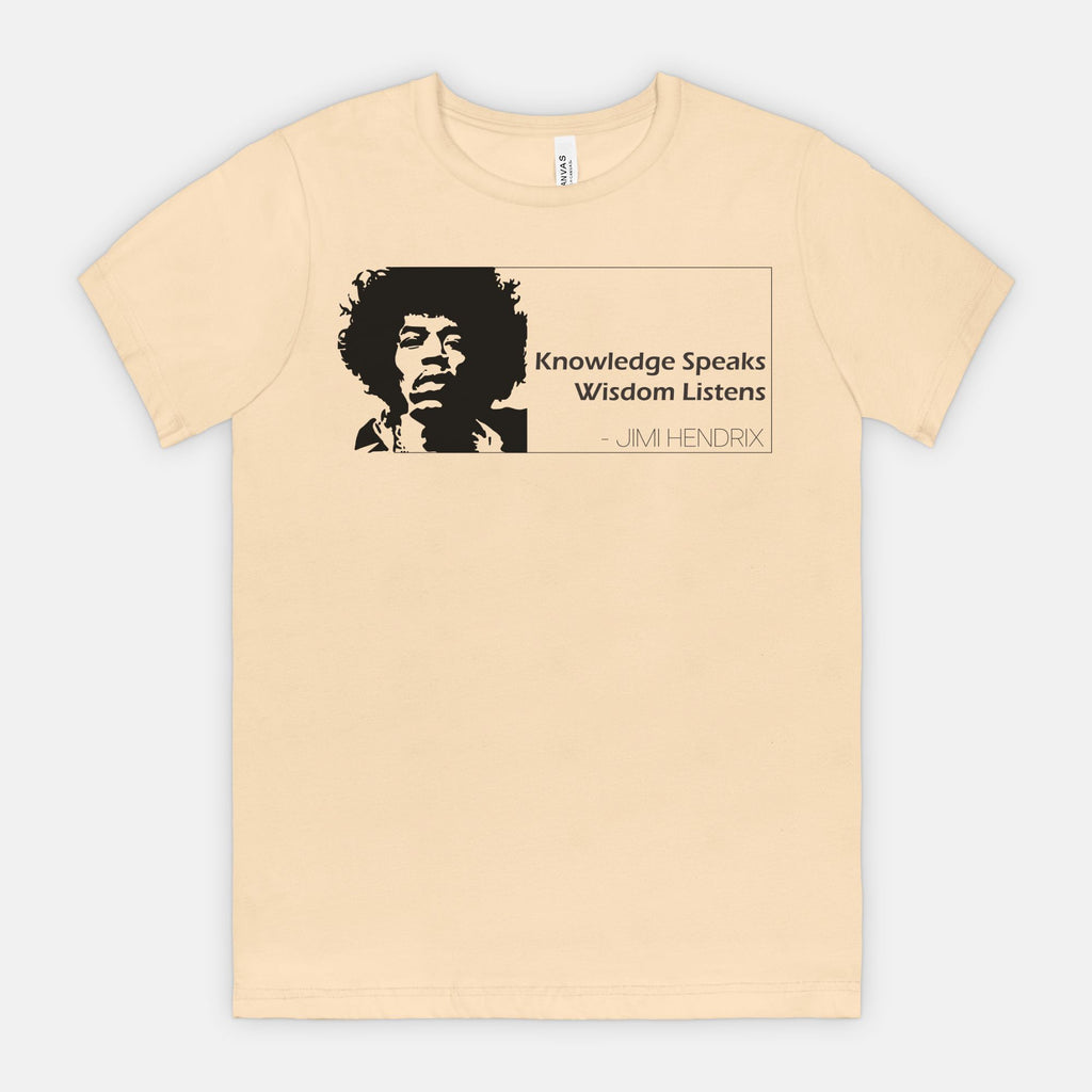 Soft Cream Bella Canvas 3001 T-shirt featuring a graphic of Jimi Hendrix and the quote ‘Knowledge Speaks Wisdom Listens,’ designed by Red Rock Chaos.