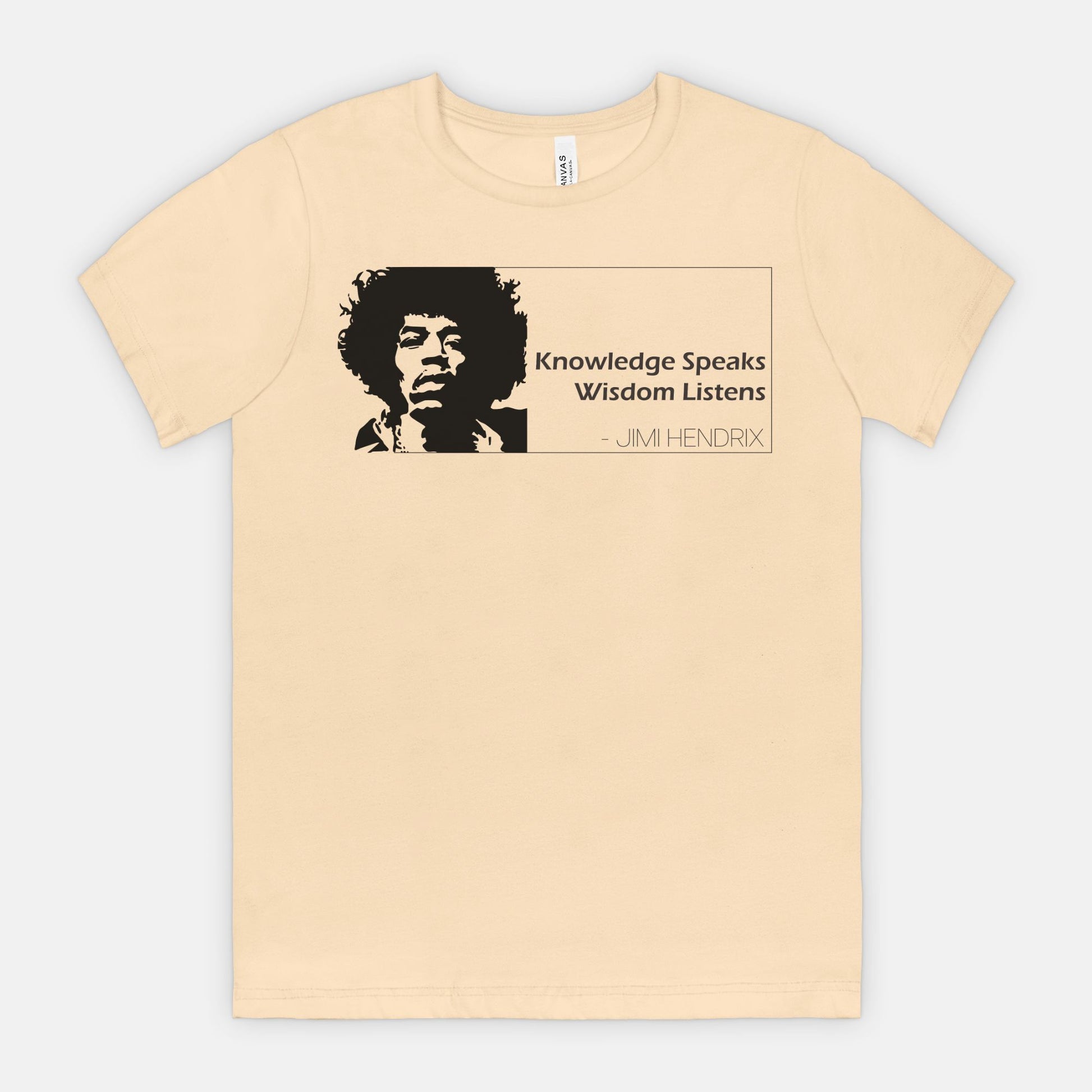Soft Cream Bella Canvas 3001 T-shirt featuring a graphic of Jimi Hendrix and the quote ‘Knowledge Speaks Wisdom Listens,’ designed by Red Rock Chaos.