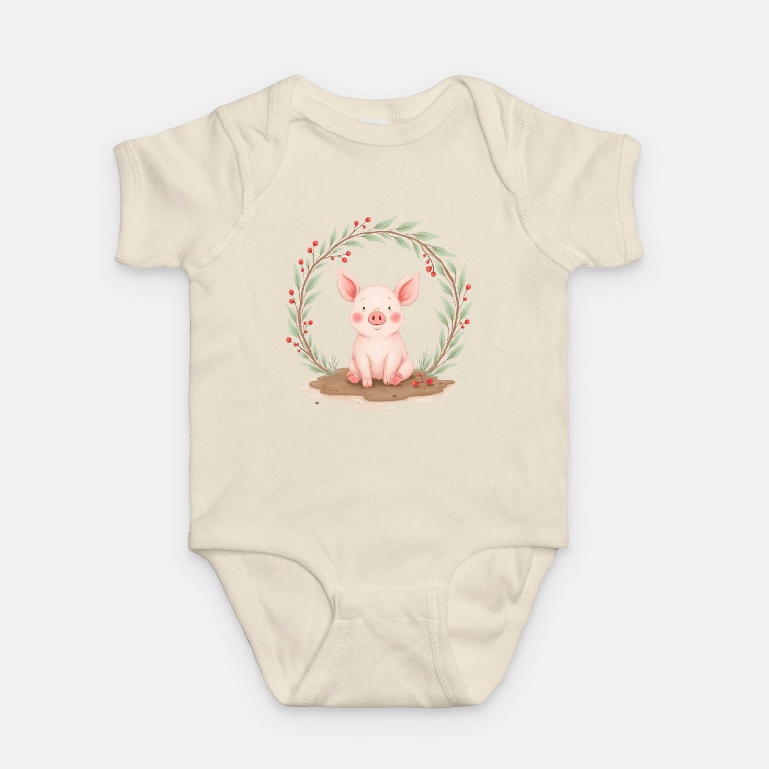 Little Chaos Crew piglet sitting in a mud puddle with eyes closed inside green leafy wreath, minimalist baby creamonesie design.