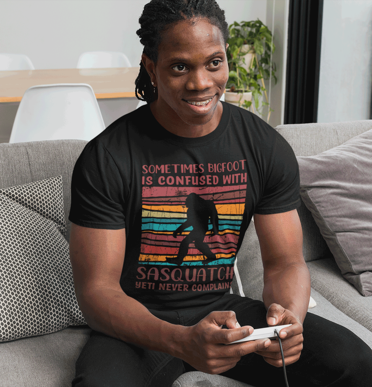 yeti-never-complains-shirt-man-sitting-couch-Black
